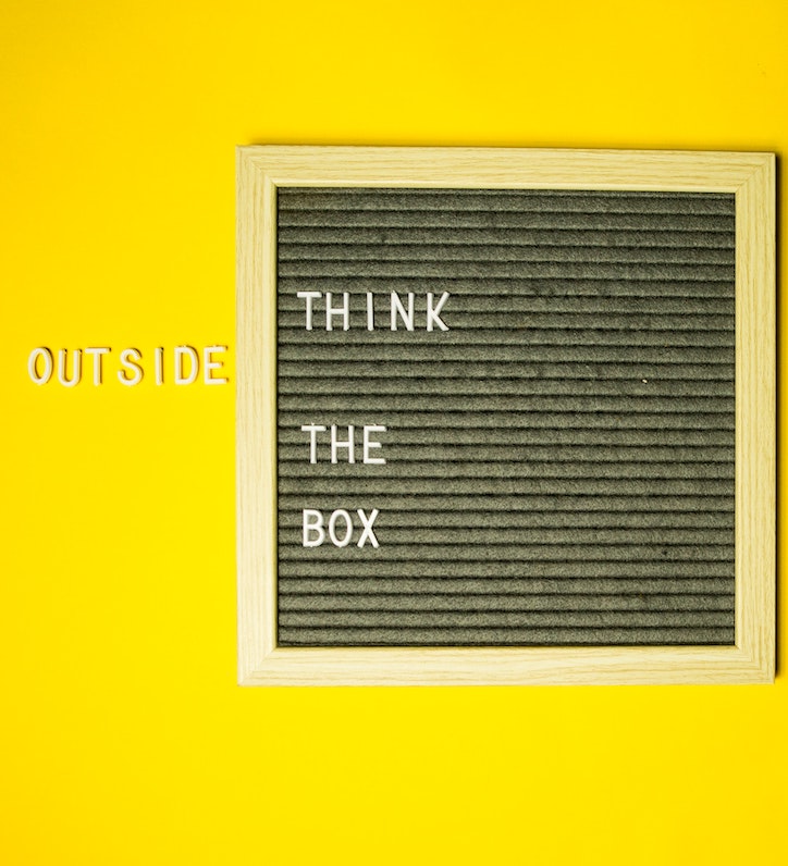 creative thinking: letters on a board saying 'think outside the box
