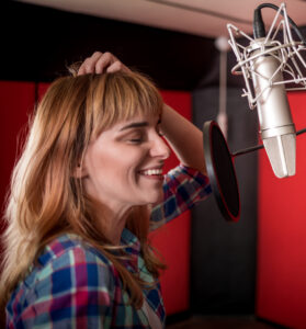 Engaging voice over: Image of smiling voice actor